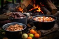 close-up of goulash ingredients beside roaring campfire