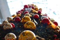 Close-up of Gourgeous Christmas Tree with Red and Gold Globes. Royalty Free Stock Photo