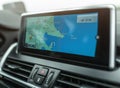 Close-up of gps navigation system device in travelling car Royalty Free Stock Photo