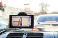 Close-up of gps navigation system device in travelling car. Royalty Free Stock Photo