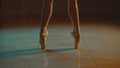 Close up graceful ballet dancer feet in pointe shoes