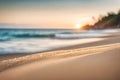 Close up of grains of beach sand with views of sea waves and sunset views