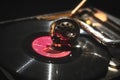 Close-up of a gramophone needle playing a vinyl music record Royalty Free Stock Photo