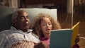 Close-up of granddaddy and granddaughter resting together Royalty Free Stock Photo