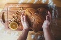 Close up of grandma`s hands cooking homemade cake