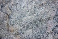 Close-up of granite rock. Natural stone wall background. Selective focus. Texture of stone Royalty Free Stock Photo