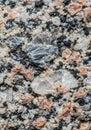 Close-up of a granite rock surface, displaying a coarse-grained texture. It features Royalty Free Stock Photo
