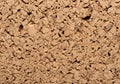 A close-up of a granular cork surface, displaying a textured pattern. The image shows Royalty Free Stock Photo