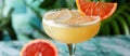 Close Up of Grapefruit Cocktail on Table Royalty Free Stock Photo