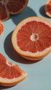 A close up of a grapefruit cut within half placed on a plate. Royalty Free Stock Photo