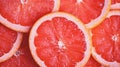 Close-up Grapefruit slices abstract background in Living Coral color of the Year 2019. Generative AI Royalty Free Stock Photo