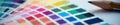 Close up of graphic design tools, vibrant color swatches , office, digital, mouse