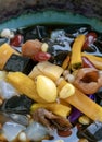 Close-up of Grass Jelly, Nuts, Cereals, Red beans, Ginkgo, Pumpkin, Corn kernels, Millet, Sweet potato, Palm seed and Jelly in