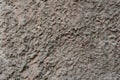 Close-up - gray-brown stone wall in the old facade of the house Royalty Free Stock Photo