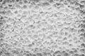 Gray cement wall in potholes patterns texture abstract background