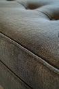 A close up of a gray couch with a black and white pattern Royalty Free Stock Photo