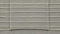 Closeup of gray fabric texture with horizontal stitching Royalty Free Stock Photo