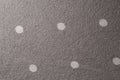Close-Up of Gray Fabric with White Polka Dot Pattern Royalty Free Stock Photo