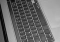 Close-up of gray keyboard, part of hardware device, selective focus