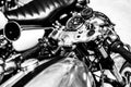 Close-up grayscale shot of an old motorcycle control panel Royalty Free Stock Photo
