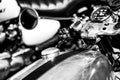 Close-up grayscale shot of an old motorcycle control panel Royalty Free Stock Photo
