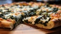 Close-up of a greasy and cheesy slice of spinach and feta pizza