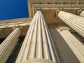 Close up of Greek style pillar columns old style historical white architecture building Royalty Free Stock Photo