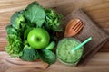 close up green apple with mixed green vegetable and green juice Royalty Free Stock Photo