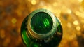 Close-up of a green beer bottle cap against a blurred golden background Royalty Free Stock Photo