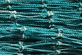 Close up green blue fishing net. Macro texture Royalty Free Stock Photo