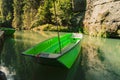 Green boat in The Kamnitz Gorge, Bohemian Switzerland,