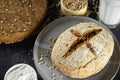 Close up green buckwheat bread and organic buckwheat milk. gray homemade Ceramic plate, linen napkin. Harmless, wellness, gluten