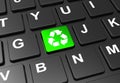 Close up green button with recycle sign on black keyboard Royalty Free Stock Photo