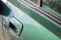 Close up green car door handle with copy space Royalty Free Stock Photo