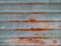 Rust on green metal sheet. Royalty Free Stock Photo