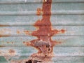 Rust on green metal sheet. Royalty Free Stock Photo