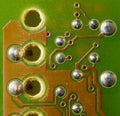 Close up of green electronic computer circuit board as background Royalty Free Stock Photo