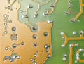 Close up of green electronic computer circuit board as background Royalty Free Stock Photo