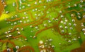 Close up of green electronic computer circuit board as background Royalty Free Stock Photo