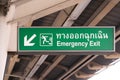 Close-up of green emergency exit sign Royalty Free Stock Photo