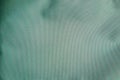Close up of a green fabric texture background with intricate details, textured background Royalty Free Stock Photo