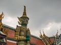 Close up Green Giant Lift golden Pagoda in Wat Phrakaew temple