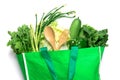 Close up a green grocery bag of mixed organic green vegetables Royalty Free Stock Photo