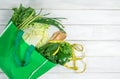 Close up a  green grocery bag of mixed organic green vegetables on white , healthy organic green food shopping and diet healthcare Royalty Free Stock Photo