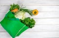 Close up a  green grocery bag of mixed organic green vegetables on white , healthy organic green food shopping and diet healthcare Royalty Free Stock Photo