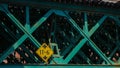 Close up from iron bridge construction with traffic sign Royalty Free Stock Photo