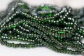 Close up of green jewel or gem - emrald type Royalty Free Stock Photo
