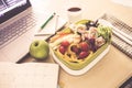 Close up green Lunch box on the work place of working desk ,Healthy eating clean food habits for diet and health care concept Royalty Free Stock Photo