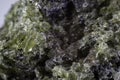 Close up on a green olivine mineral.