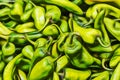 close up green peppers on market stand Royalty Free Stock Photo